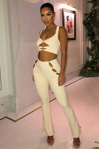 Cut-Out Crop Top and Leggings Set for Women – Fitted Two-Piece Outfit with Decorative Accents for Parties and Trendy Looks