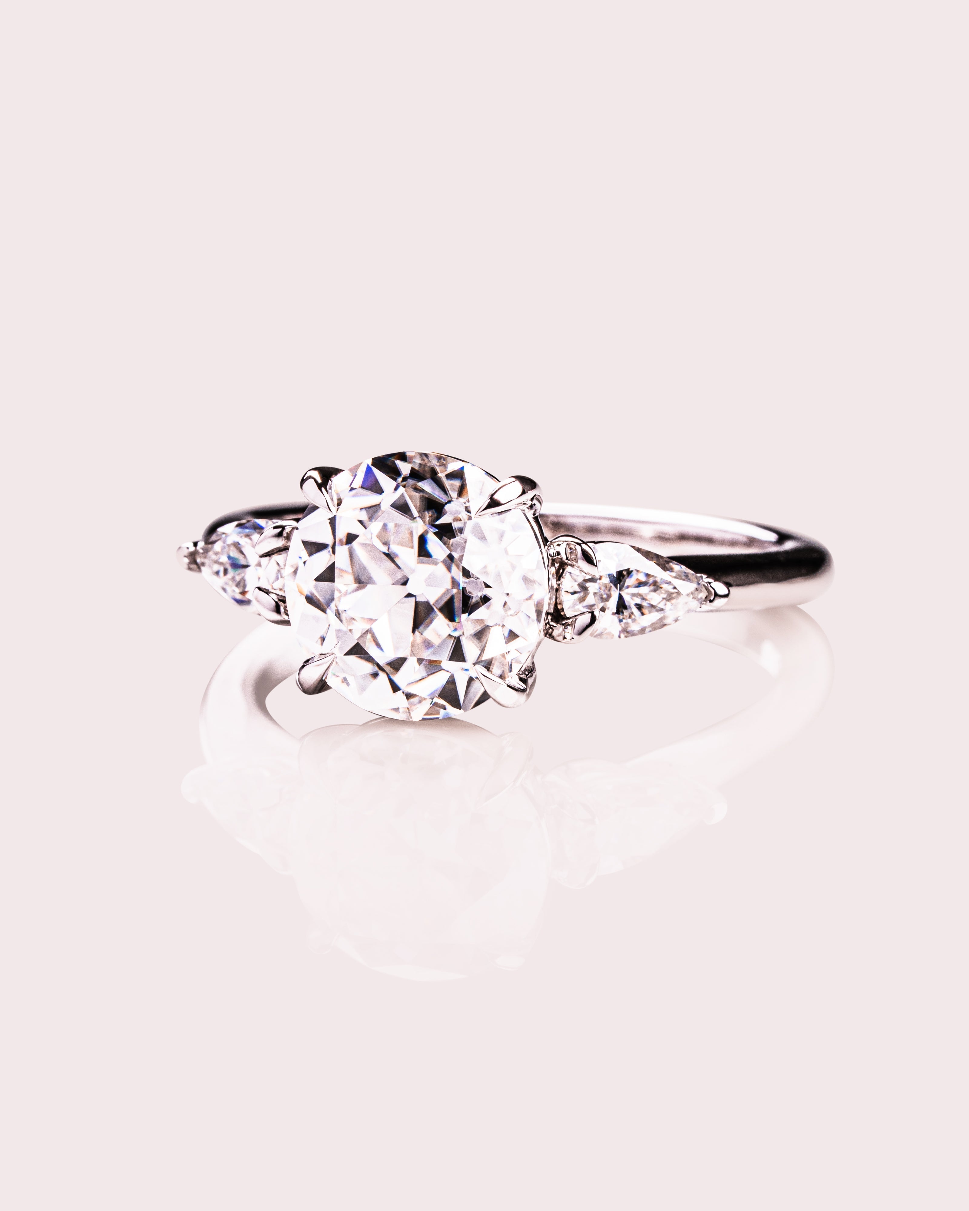 Round and Pear-Shaped Moissanite Engagement Ring – Brilliant, Ethical & Timeless