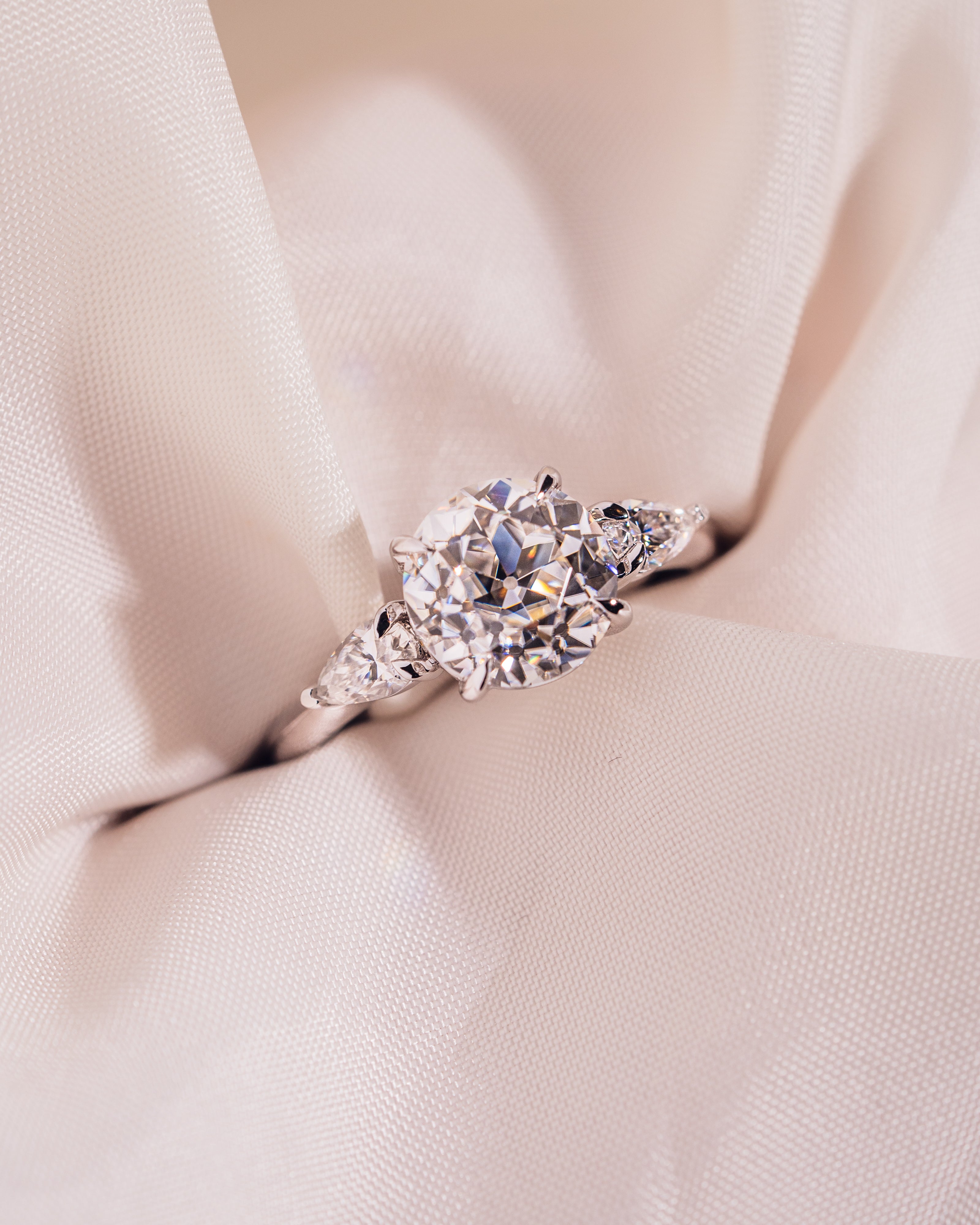 Round and Pear-Shaped Moissanite Engagement Ring – Brilliant, Ethical & Timeless