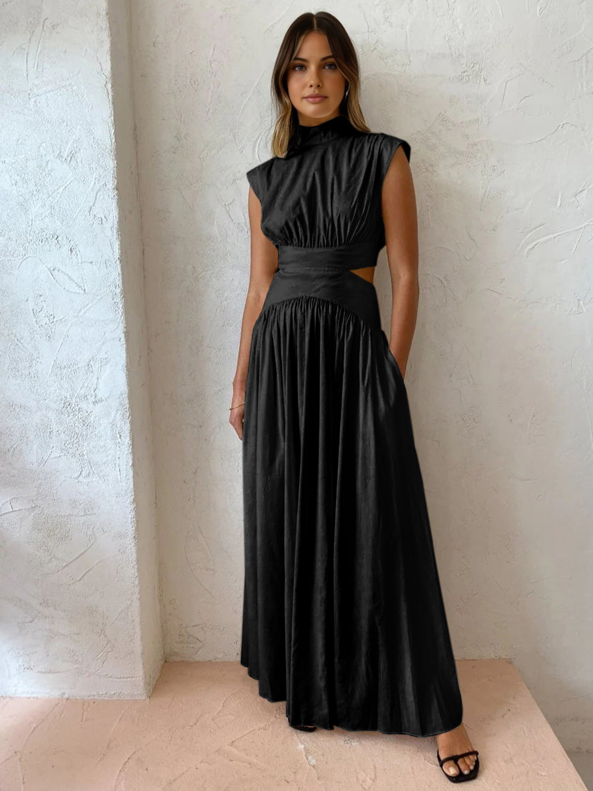 Nerina Vale. – Sleeveless Cut-Out Maxi Gown