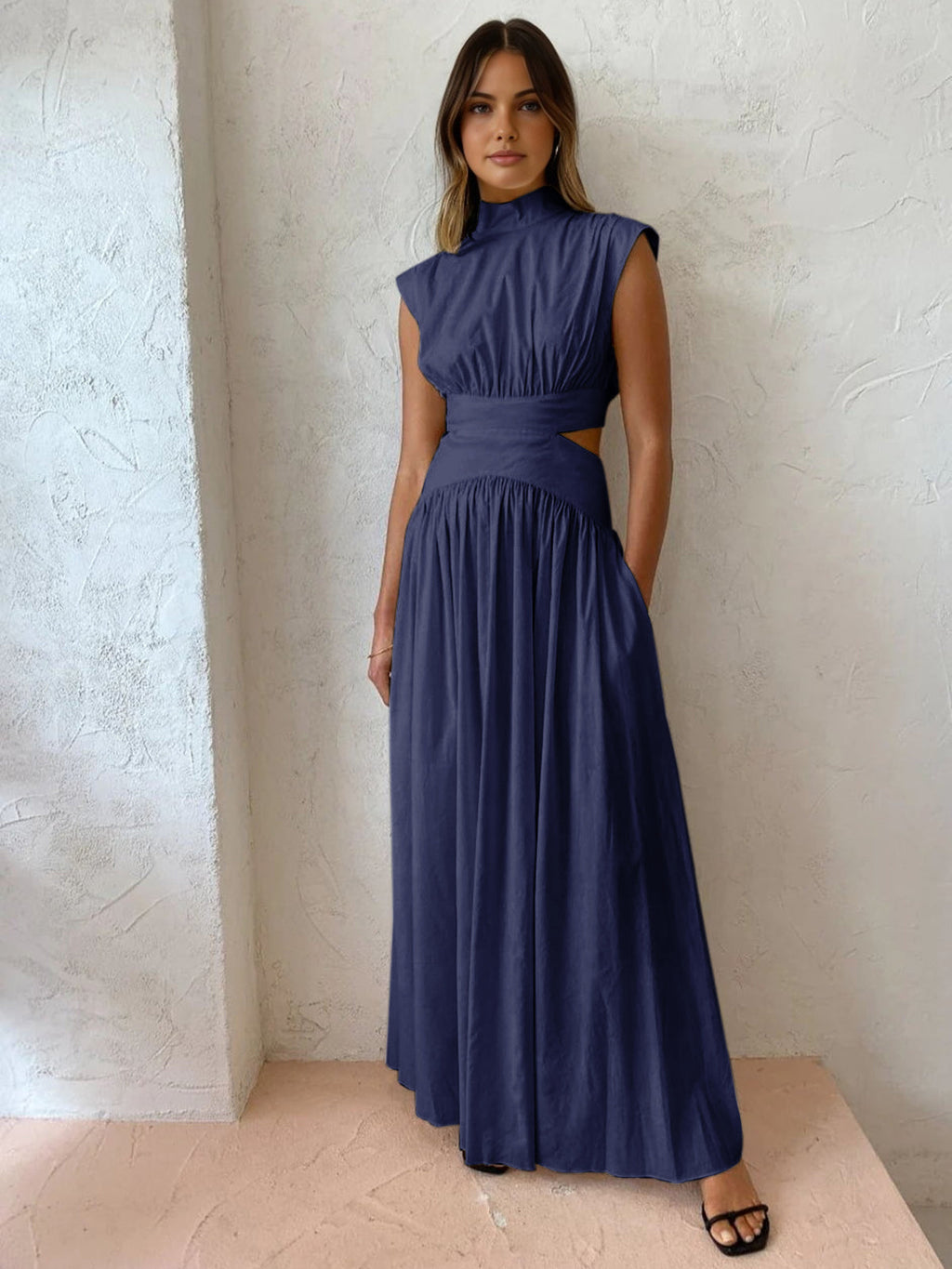 Nerina Vale. – Sleeveless Cut-Out Maxi Gown