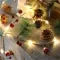 Battery Operated LED Christmas Garland Lights with Warm White Micro Bulbs and Pine Cones - Image 12