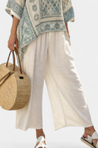 Quinley | Stylish Printed Blouse with Relaxed Wide-Leg White Trousers