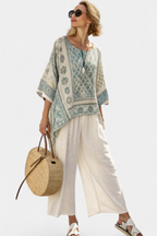 Quinley | Stylish Printed Blouse with Relaxed Wide-Leg White Trousers