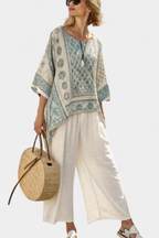 Quinley | Stylish Printed Blouse with Relaxed Wide-Leg White Trousers