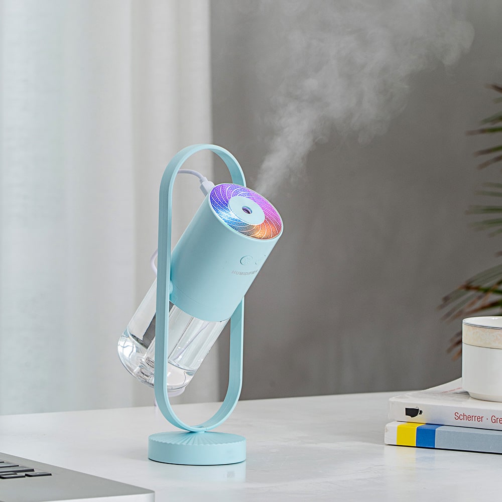 Kids' Mini Ultrasonic Cool Mist Humidifier with Rotating Stand and LED Projector Night Light - Image 17