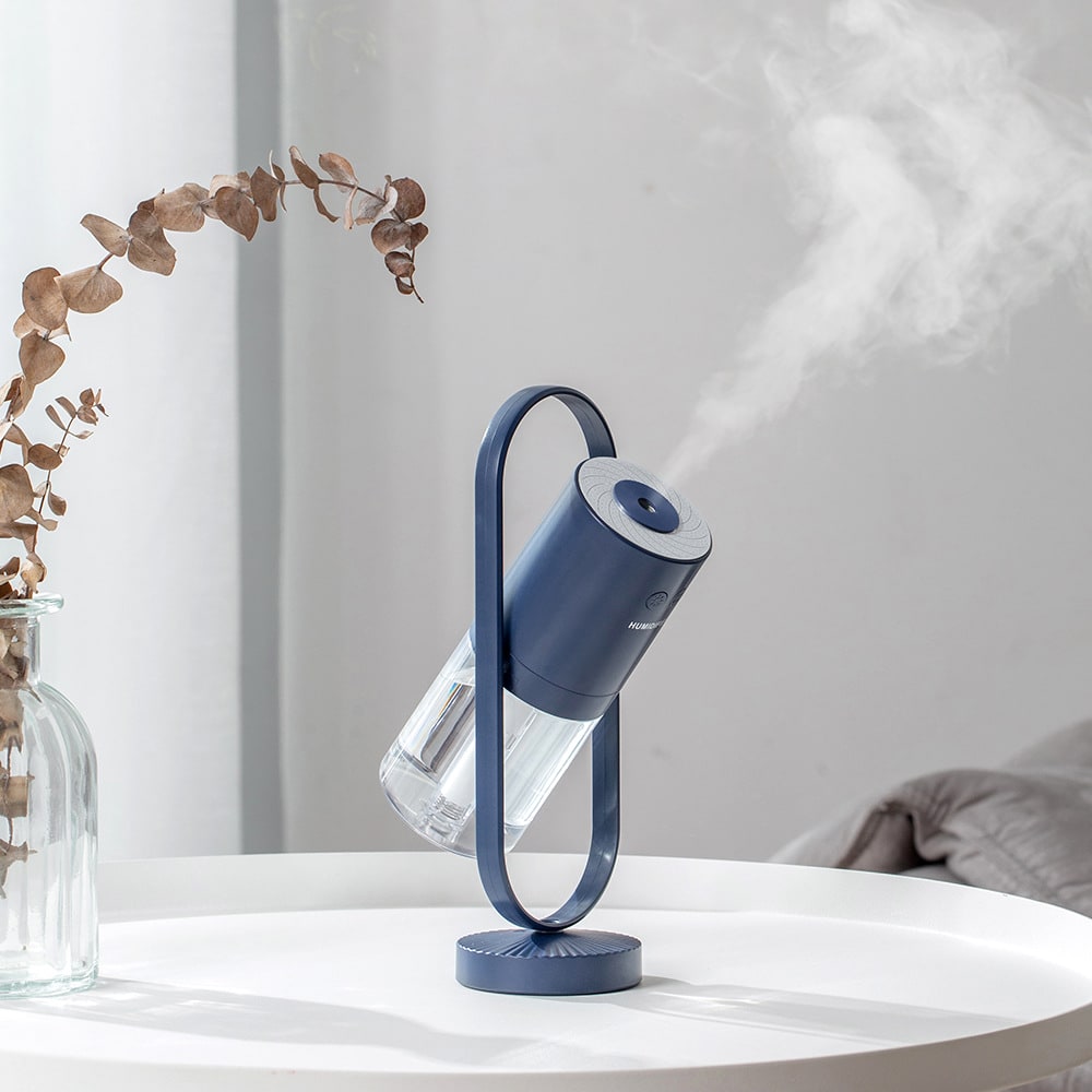 Kids' Mini Ultrasonic Cool Mist Humidifier with Rotating Stand and LED Projector Night Light - Image 18