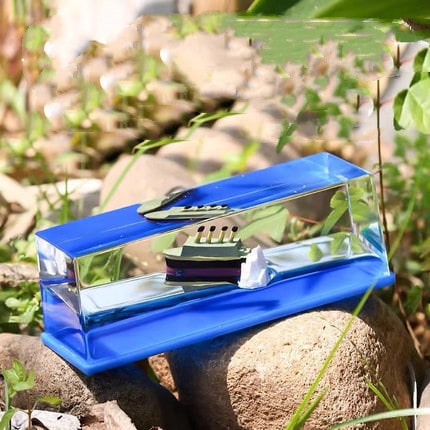 Liquid Wave Paperweight with Floating Ship and LED Light Base - Image 14
