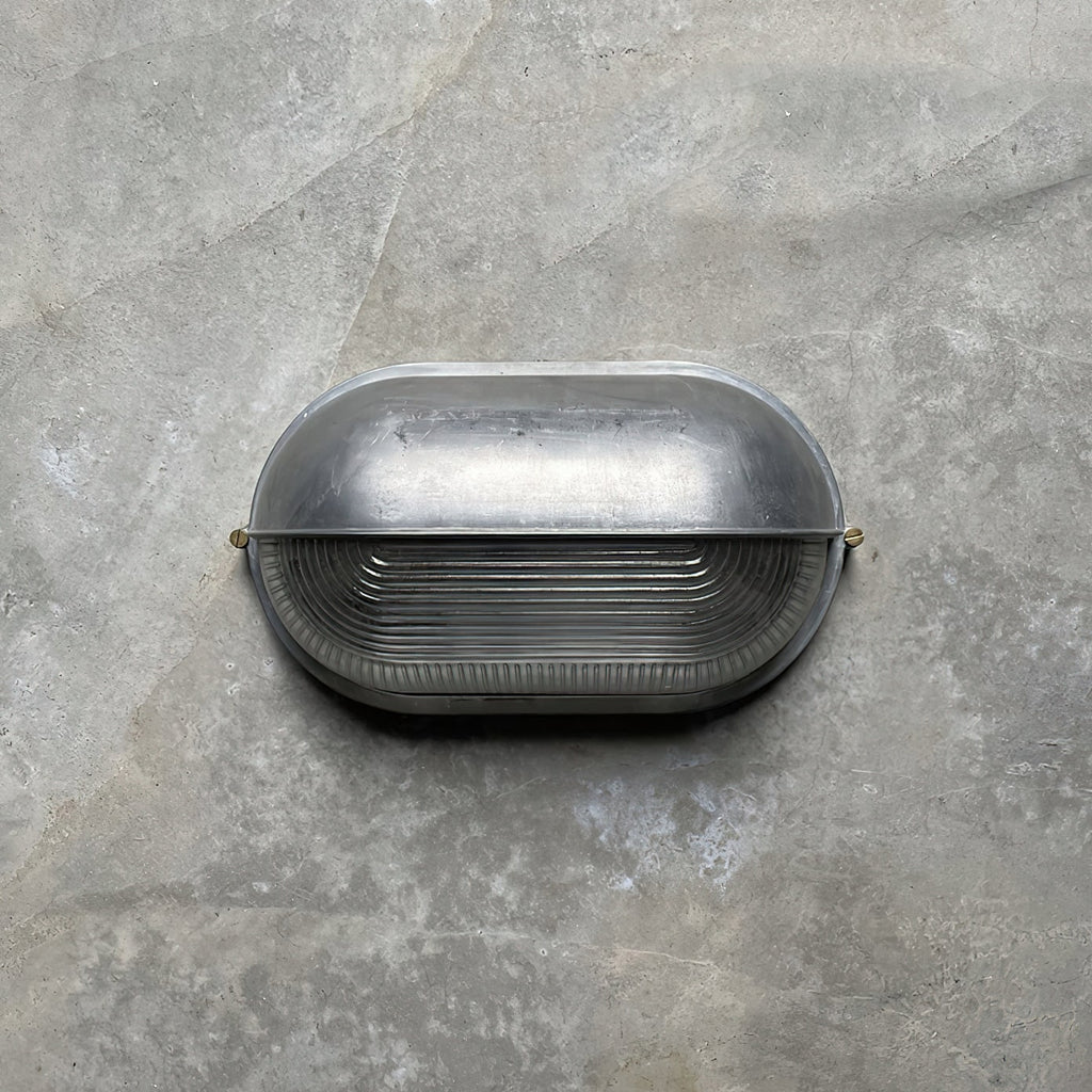 Outdoor Bulkhead Wall Light with Oval Shield and Ribbed Glass Diffuser - Image 44