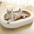 Oval Plush Cat Scratcher Bed with Woven Mat and Padded Bolster - Image 1