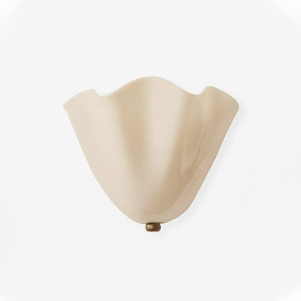 Wall Sconce with Wavy Glass Shade and Warm Ambient Lighting - Image 1