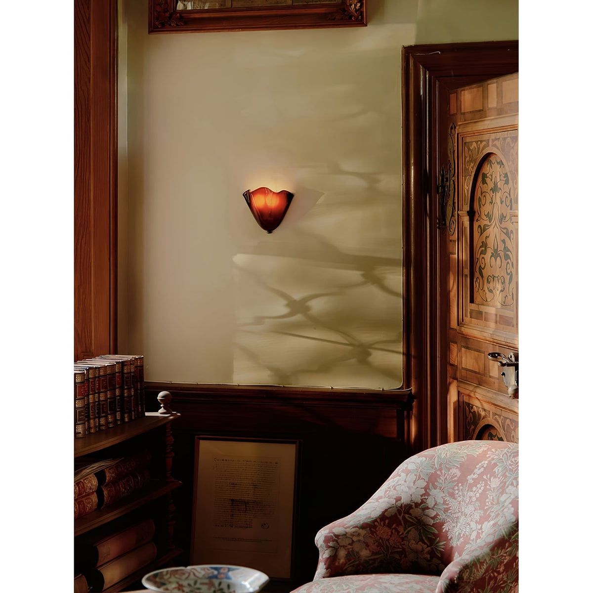 Wall Sconce with Wavy Glass Shade and Warm Ambient Lighting - Image 14