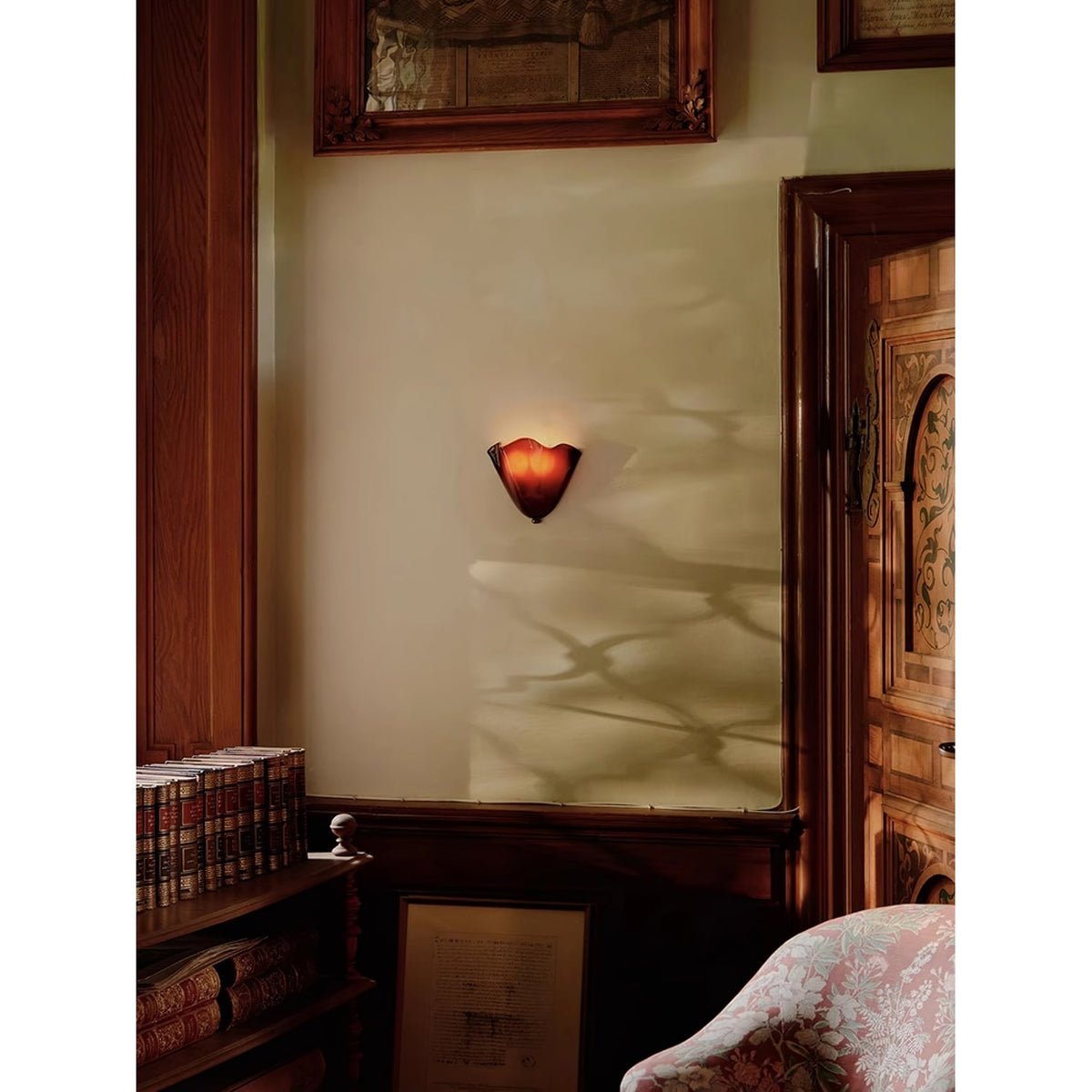 Wall Sconce with Wavy Glass Shade and Warm Ambient Lighting - Image 17