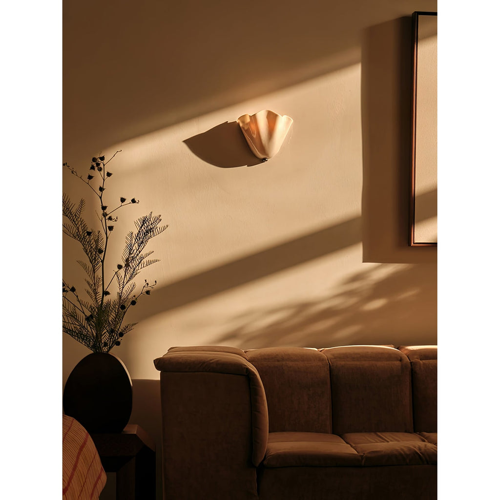 Wall Sconce with Wavy Glass Shade and Warm Ambient Lighting - Image 18