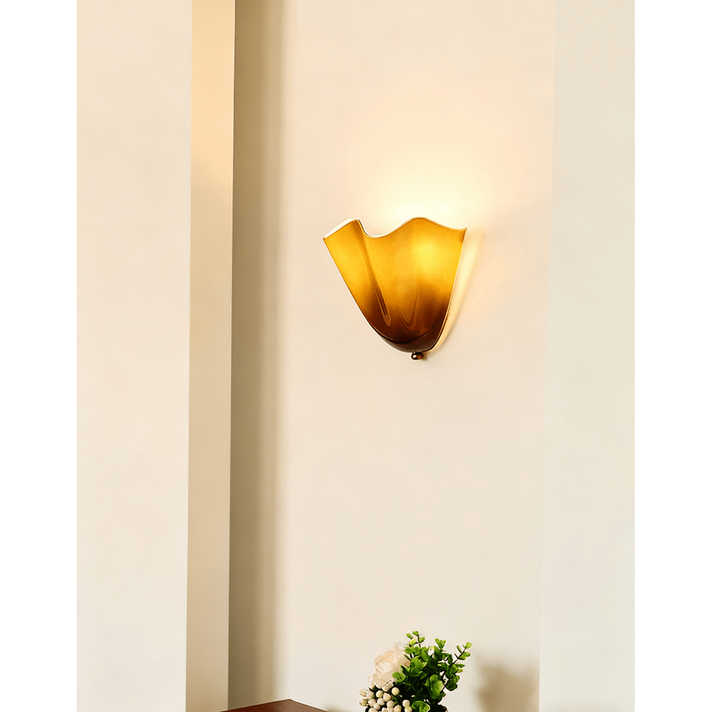 Wall Sconce with Wavy Glass Shade and Warm Ambient Lighting - Image 2