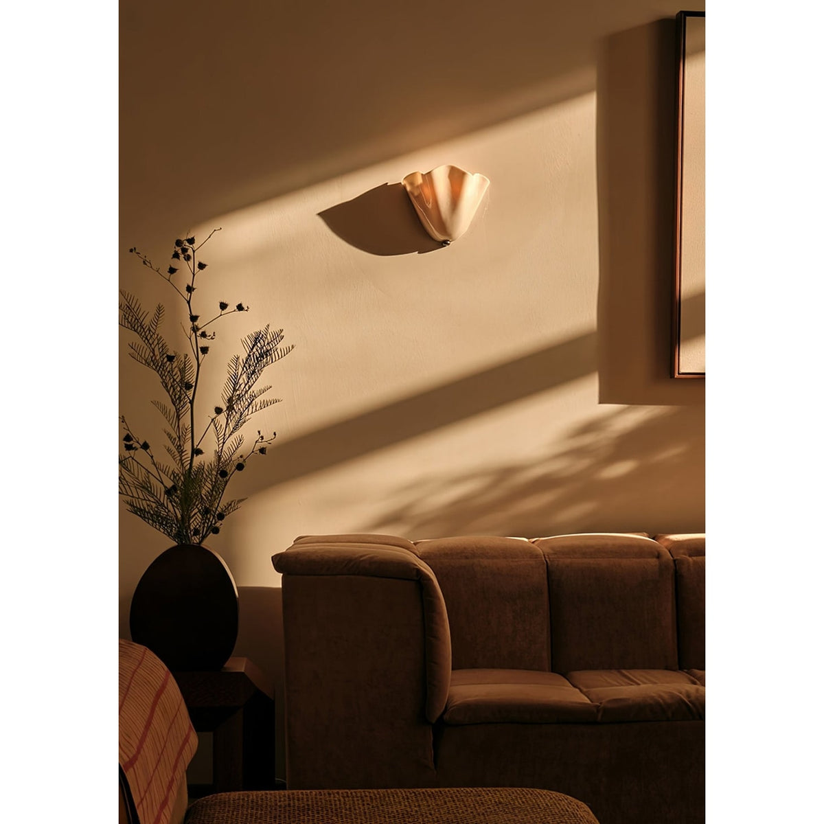 Wall Sconce with Wavy Glass Shade and Warm Ambient Lighting - Image 20