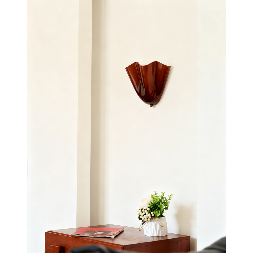 Wall Sconce with Wavy Glass Shade and Warm Ambient Lighting - Image 3