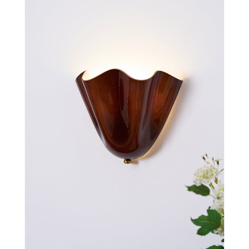 Wall Sconce with Wavy Glass Shade and Warm Ambient Lighting - Image 38