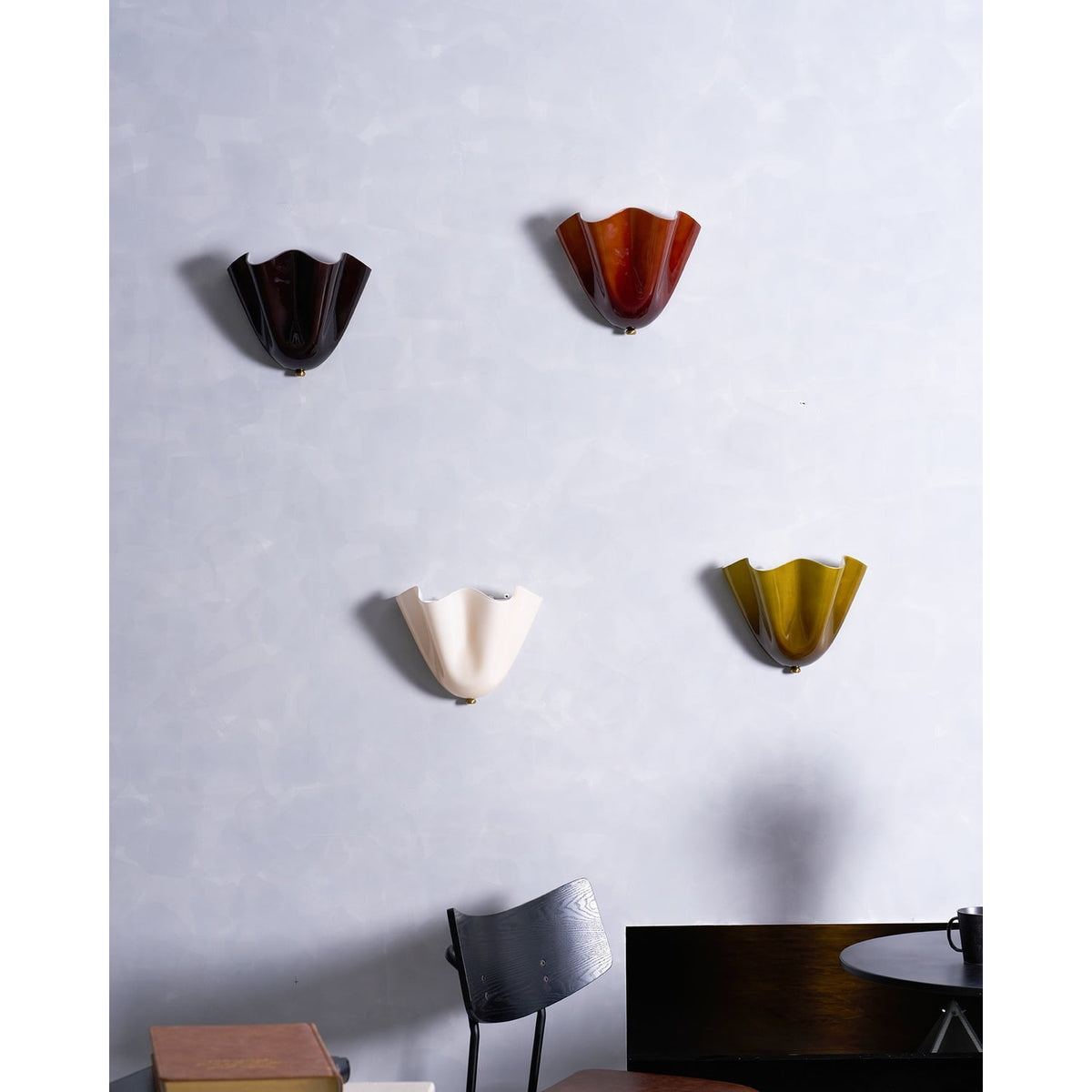 Wall Sconce with Wavy Glass Shade and Warm Ambient Lighting - Image 44