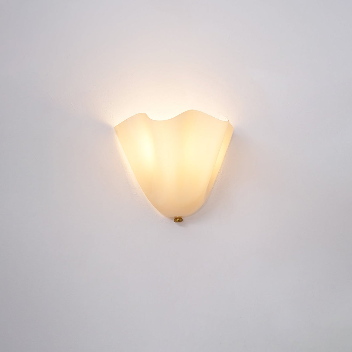 Wall Sconce with Wavy Glass Shade and Warm Ambient Lighting - Image 52