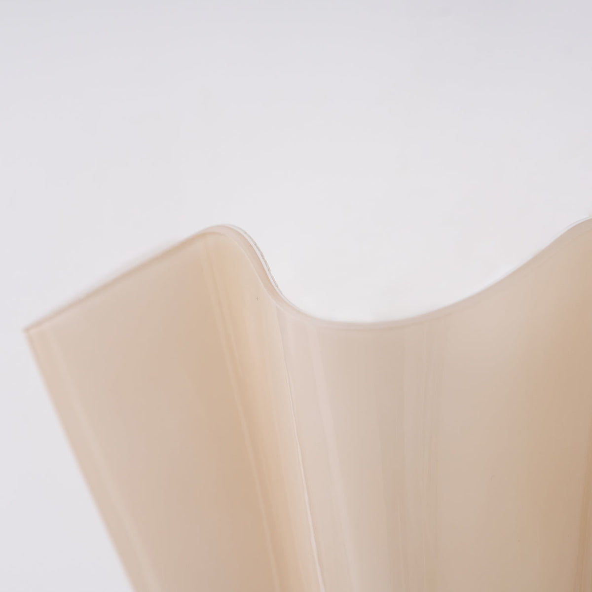 Wall Sconce with Wavy Glass Shade and Warm Ambient Lighting - Image 54