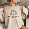 Women's Graphic Crewneck Oversized Sweatshirt with Sun Waves and Biblical Text - Image 1